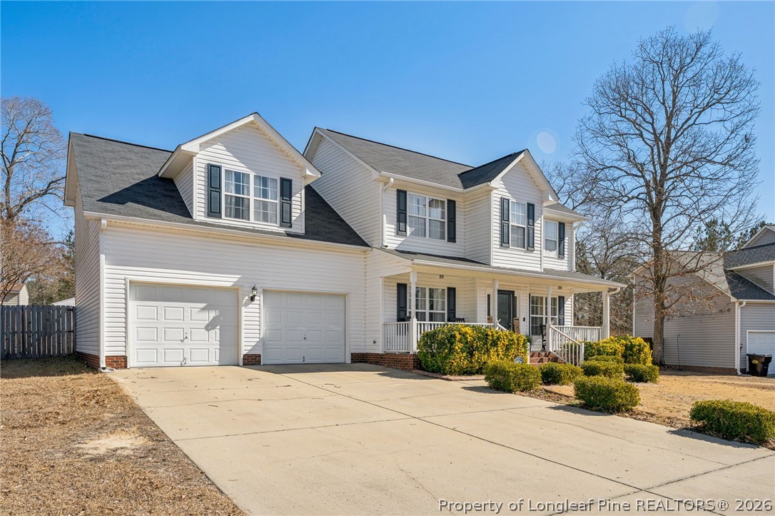 295 Pender Road Spring Lake, NC 28390 - Photo 2 of 30 a front view of a house with a yard