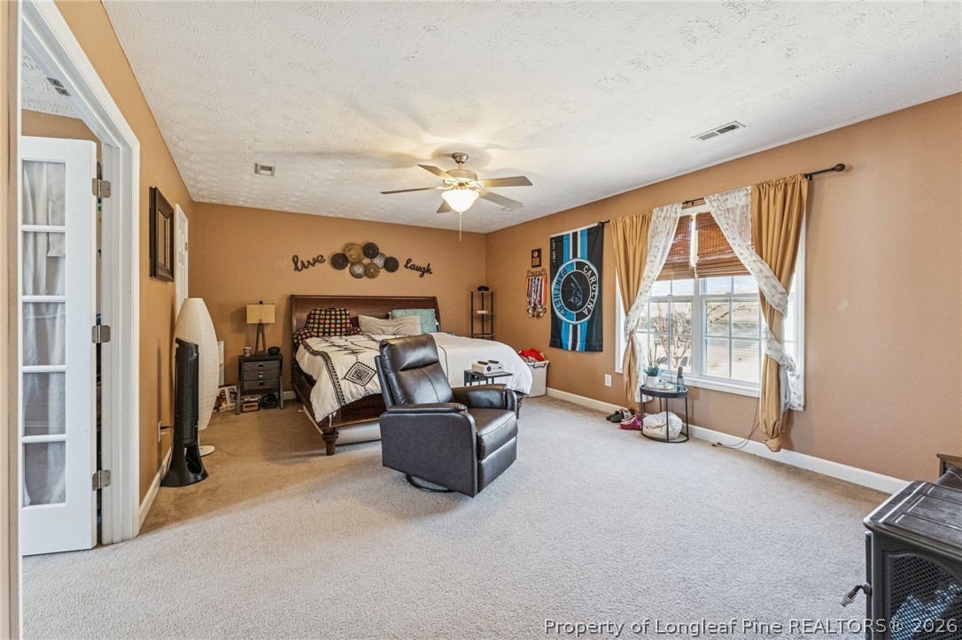 295 Pender Road Spring Lake, NC 28390 - Photo 28 of 30 a view of living room with furniture and a large window