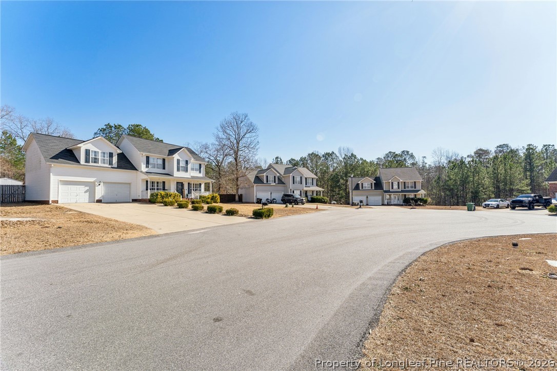 295 Pender Road Spring Lake, NC 28390 - Photo 3 of 30 a view of road with houses