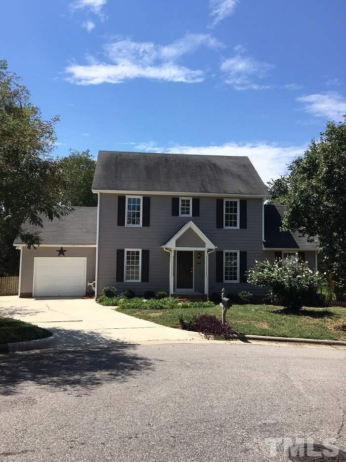 4100 Landrum Lane Raleigh, NC 27616 - Photo 1 of 12 a front view of a house with a yard