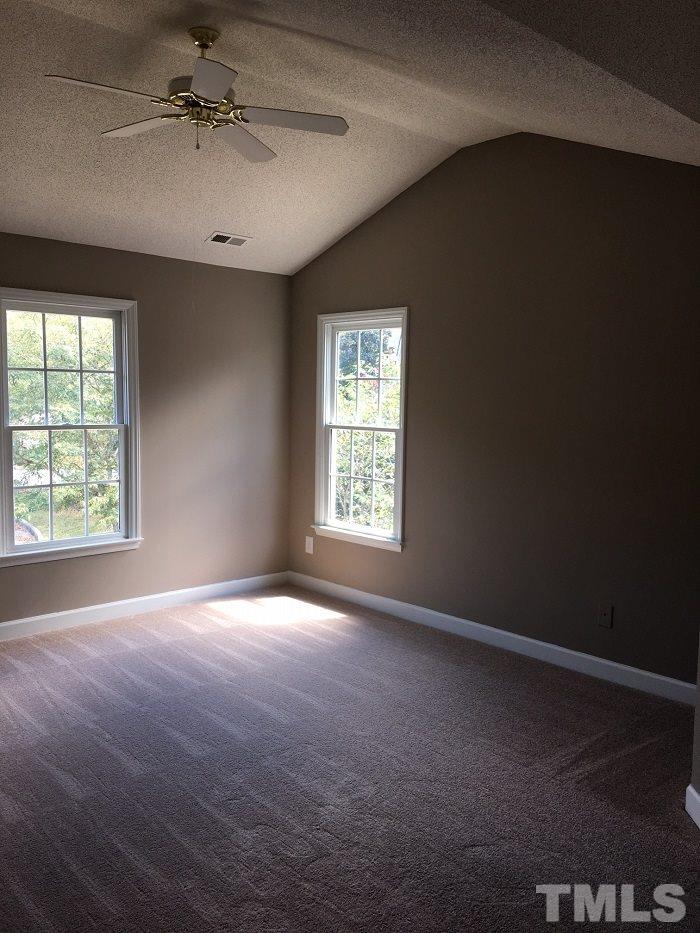 4100 Landrum Lane Raleigh, NC 27616 - Photo 11 of 12 a view of an empty room with a window