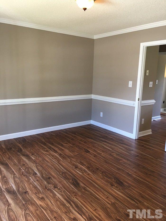 4100 Landrum Lane Raleigh, NC 27616 - Photo 3 of 12 a view of a room with wooden floor