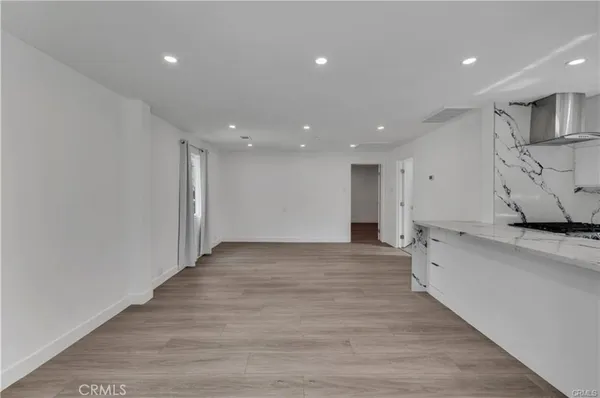 a view of a kitchen with a sink