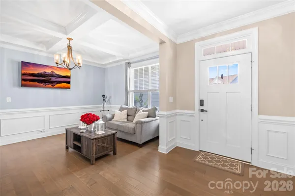 a view of a livingroom with furniture and window