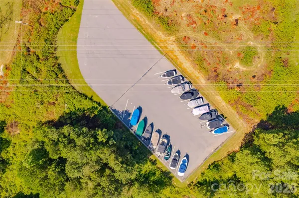 a view of swimming pool with a yard