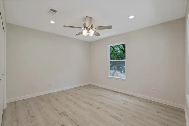 a view of a porch and garden