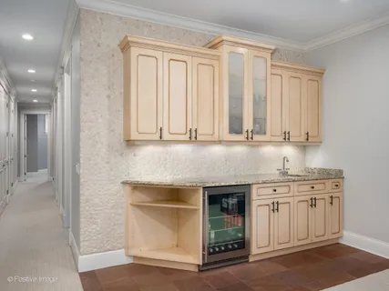 a kitchen with stainless steel appliances granite countertop a stove and a sink