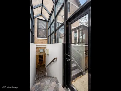 a view of a house with a glass door