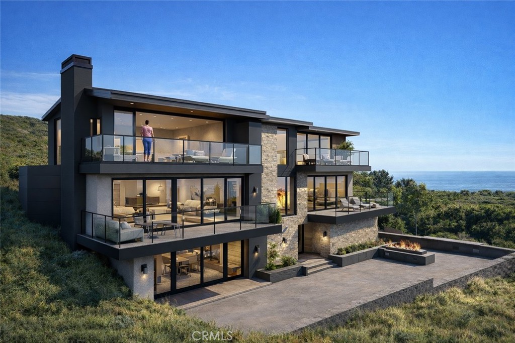 29675 Cuthbert Road Malibu, CA 90265 - Photo 5 of 7 a backyard of a house with barbeque oven and outdoor seating