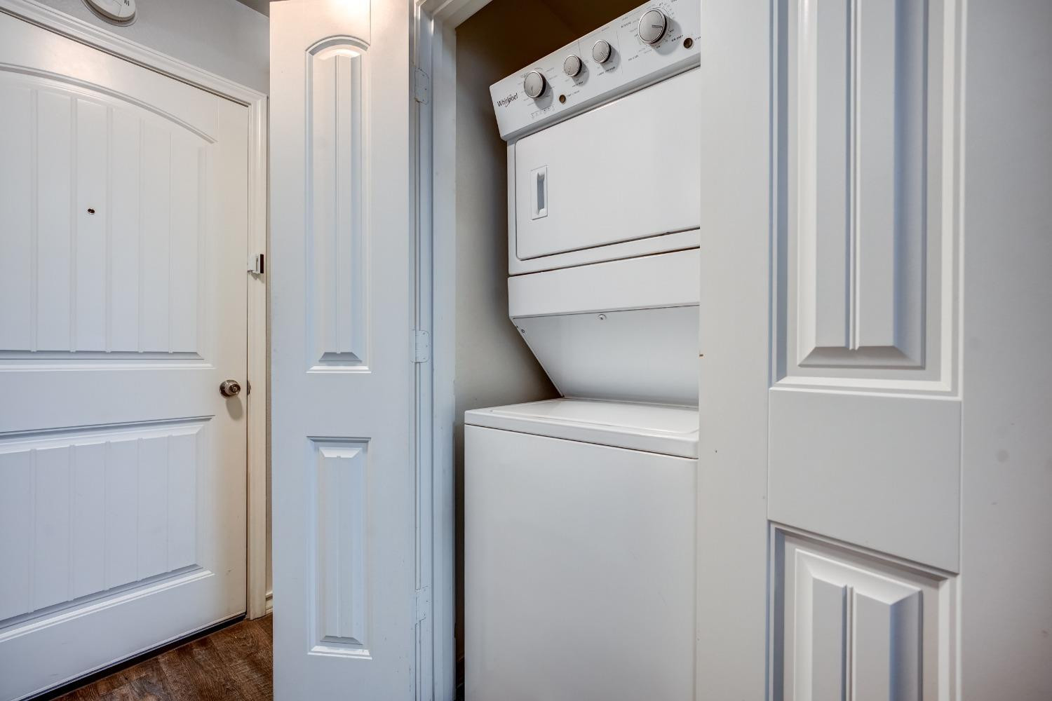 3450 Itasca Street Lubbock, TX 79415 - Photo 8 of 24 a utility room with dryer and washer