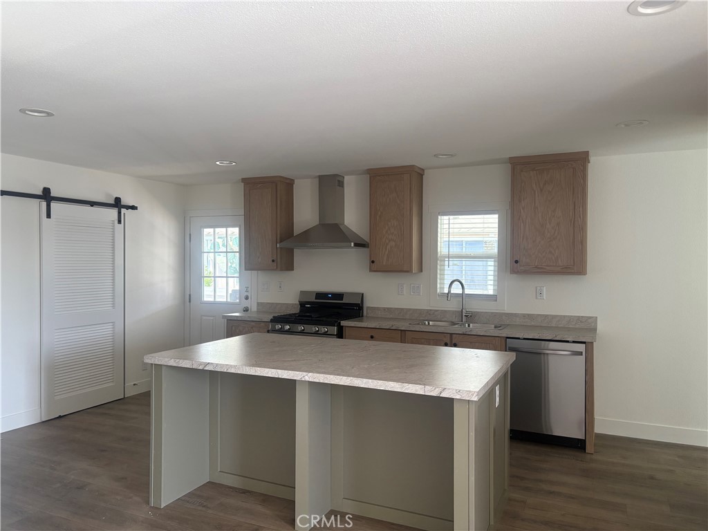 4361 Mission Boulevard, Unit 151 Montclair, CA 91763 - Photo 17 of 39 a kitchen with cabinets a sink and appliances