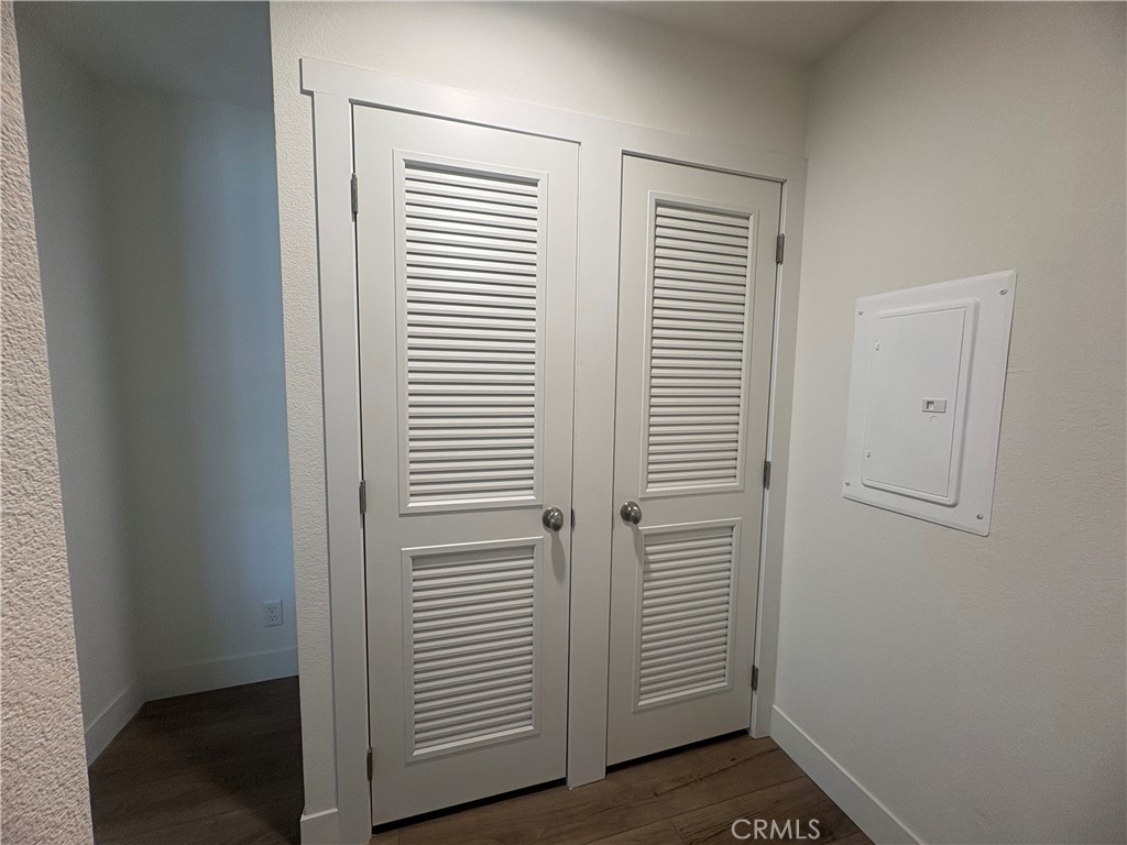 4361 Mission Boulevard, Unit 151 Montclair, CA 91763 - Photo 27 of 39 a view of a room with wooden floor