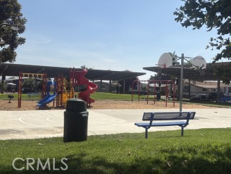 4361 Mission Boulevard, Unit 151 Montclair, CA 91763 - Photo 38 of 39 a park view with a bench