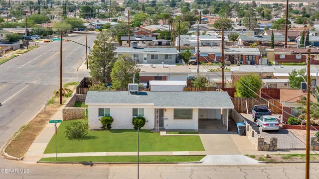 an aerial view of residential house with an outdoor space