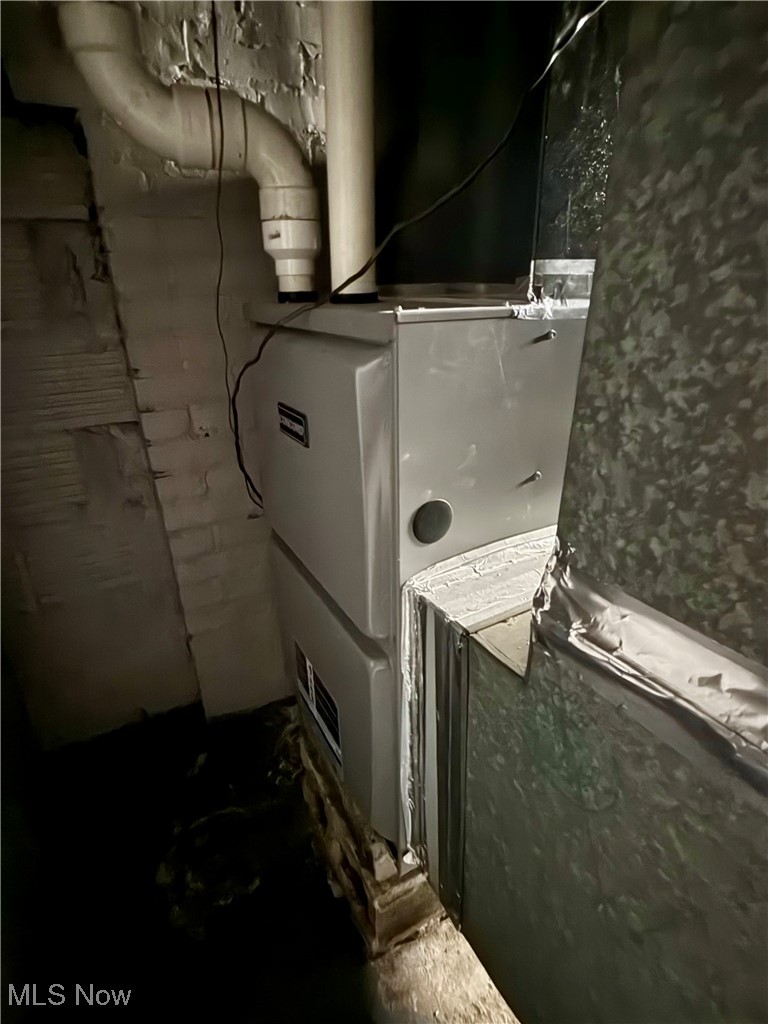 237 Beech Road Weirton, WV 26062 - Photo 21 of 24 Utility room featuring heating unit