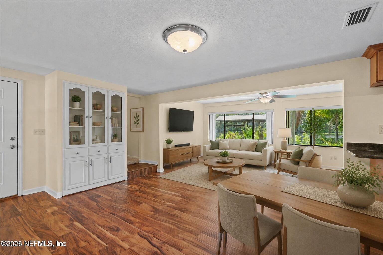 145 Finnigan Road Satsuma, FL 32189 - Photo 5 of 43 a living room with furniture and a flat screen tv