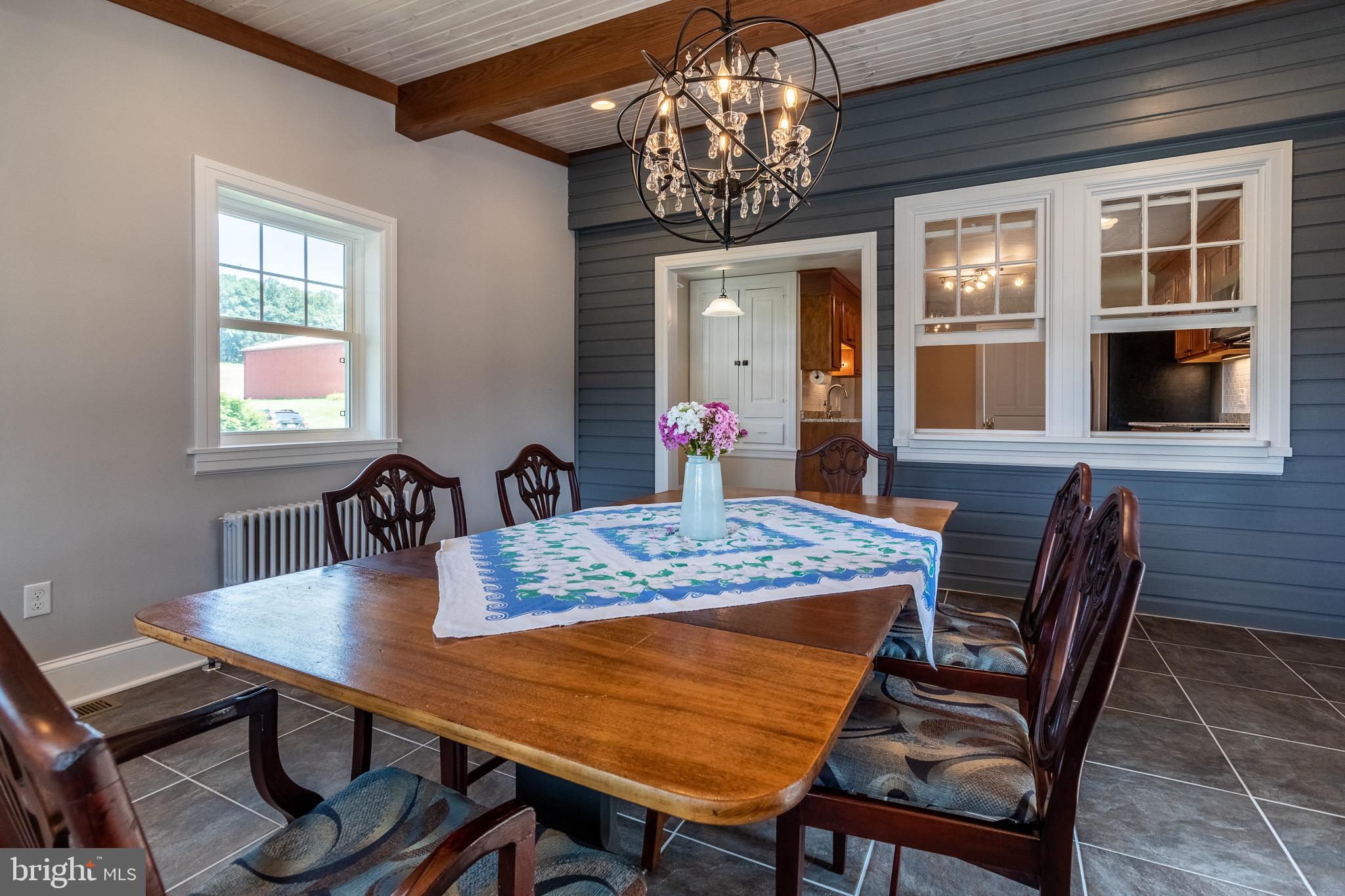110 Lyndell Road Downingtown, PA 19335 - Photo 11 of 37 a view of a dining room with furniture window and wooden floor