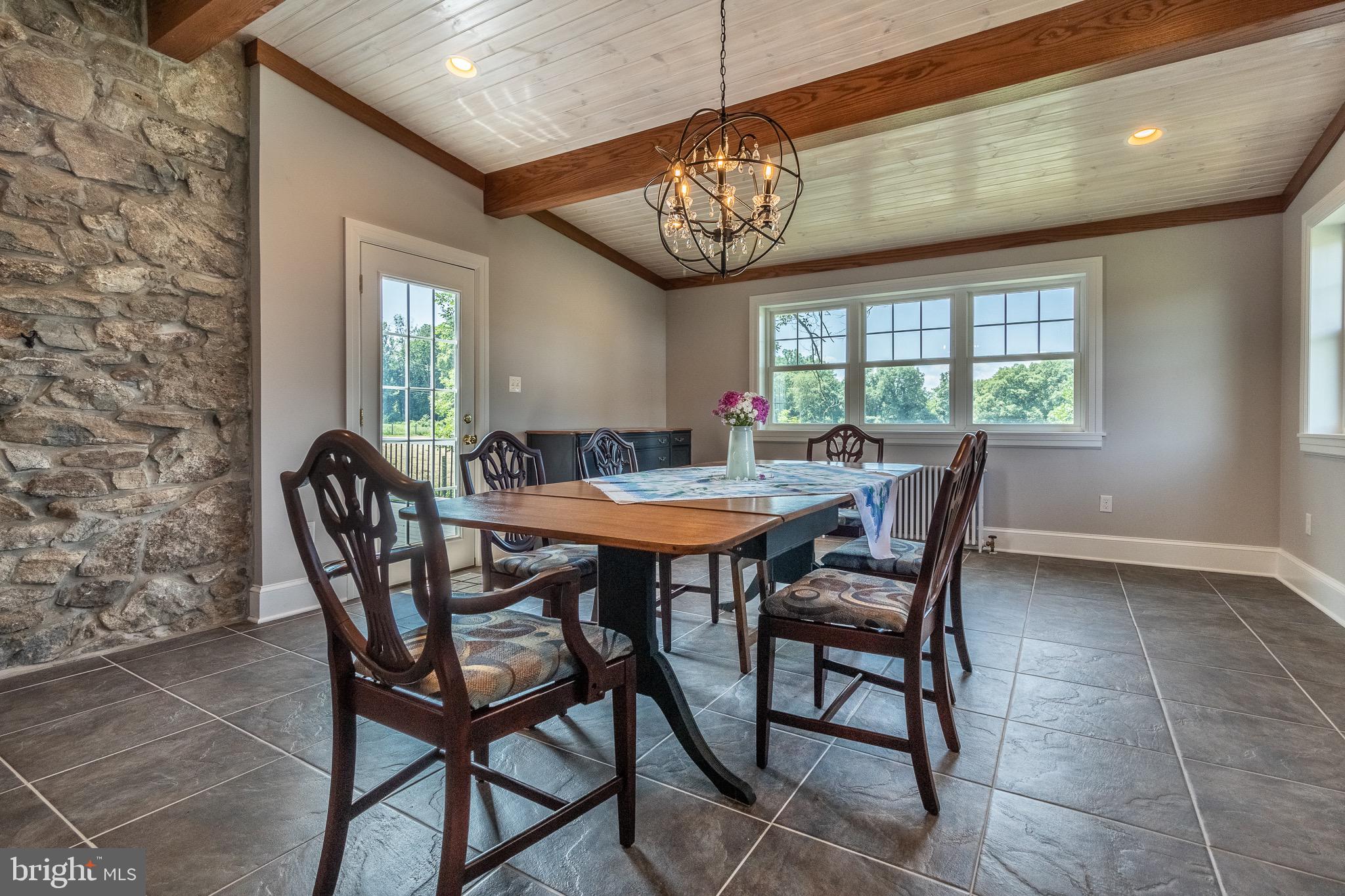 110 Lyndell Road Downingtown, PA 19335 - Photo 12 of 37 a view of a dining room with furniture window and outside view