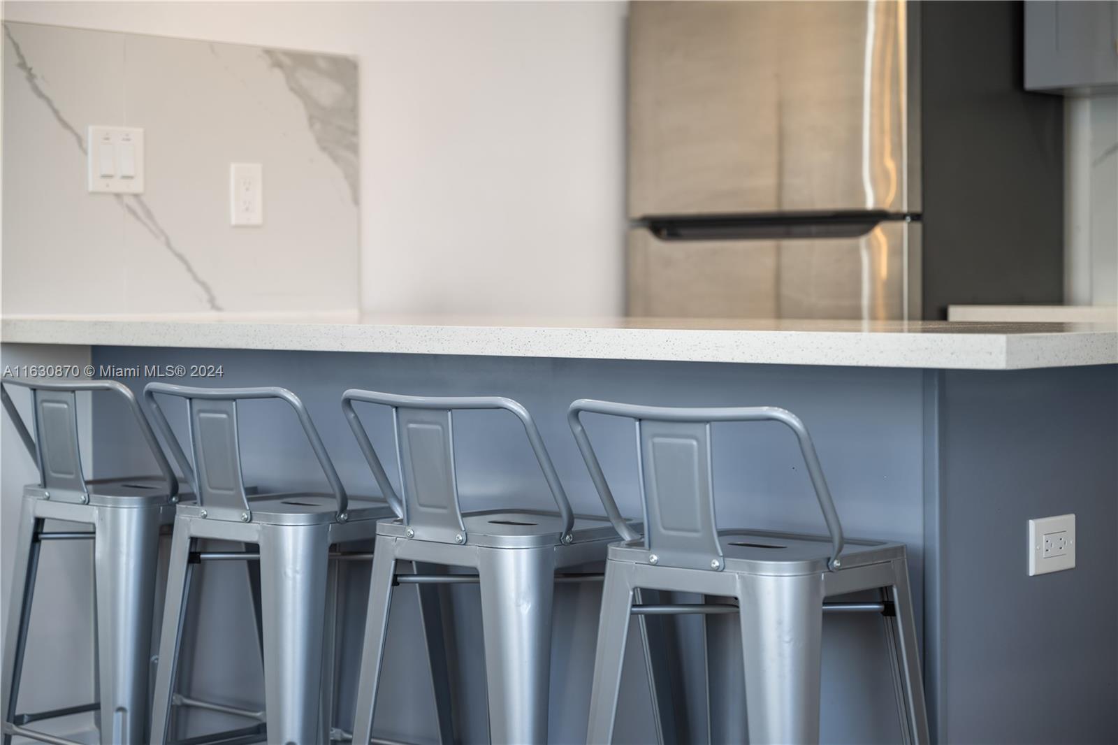 1648 Southwest 7th Street Miami, FL 33135 - Photo 16 of 23 a kitchen with a sink a refrigerator and window