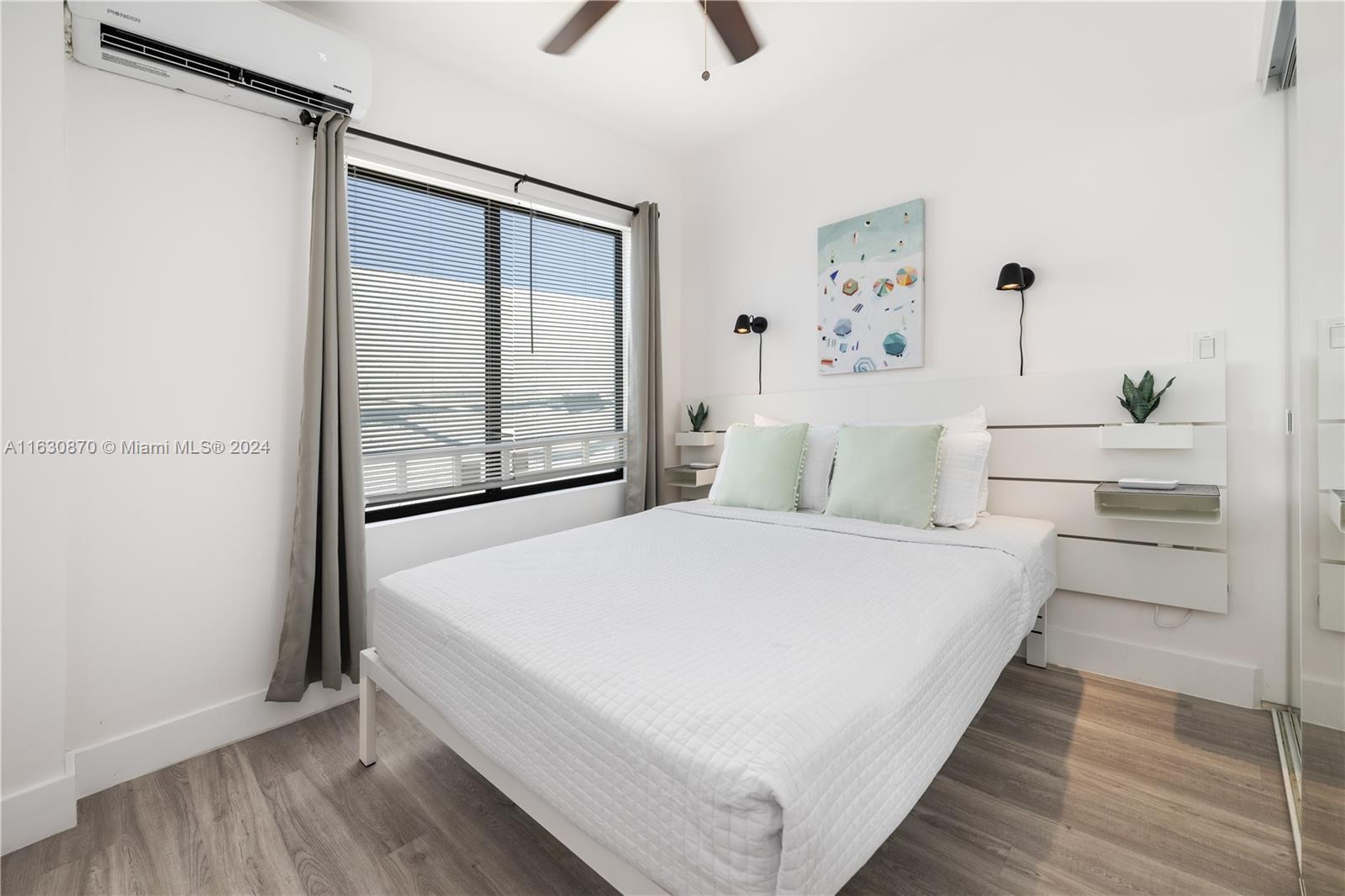 1648 Southwest 7th Street Miami, FL 33135 - Photo 19 of 23 a large white bed in a white room