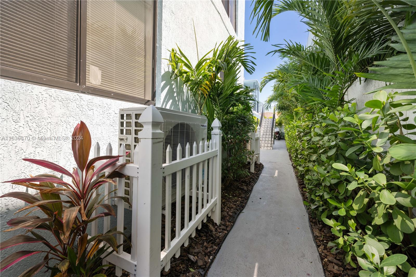 1648 Southwest 7th Street Miami, FL 33135 - Photo 6 of 23 a balcony with table and chairs
