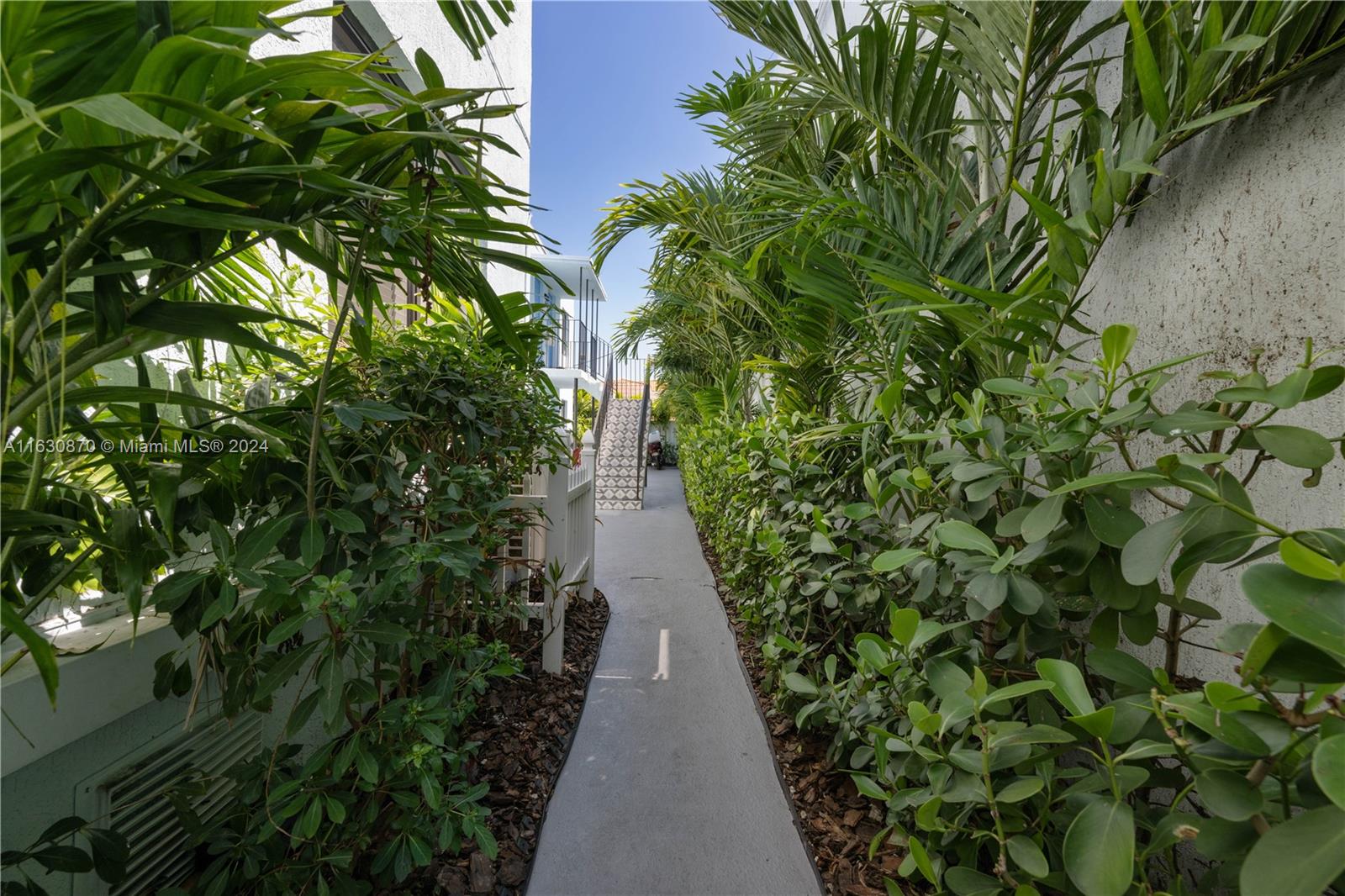 1648 Southwest 7th Street Miami, FL 33135 - Photo 7 of 23 a view of a pathway with plants