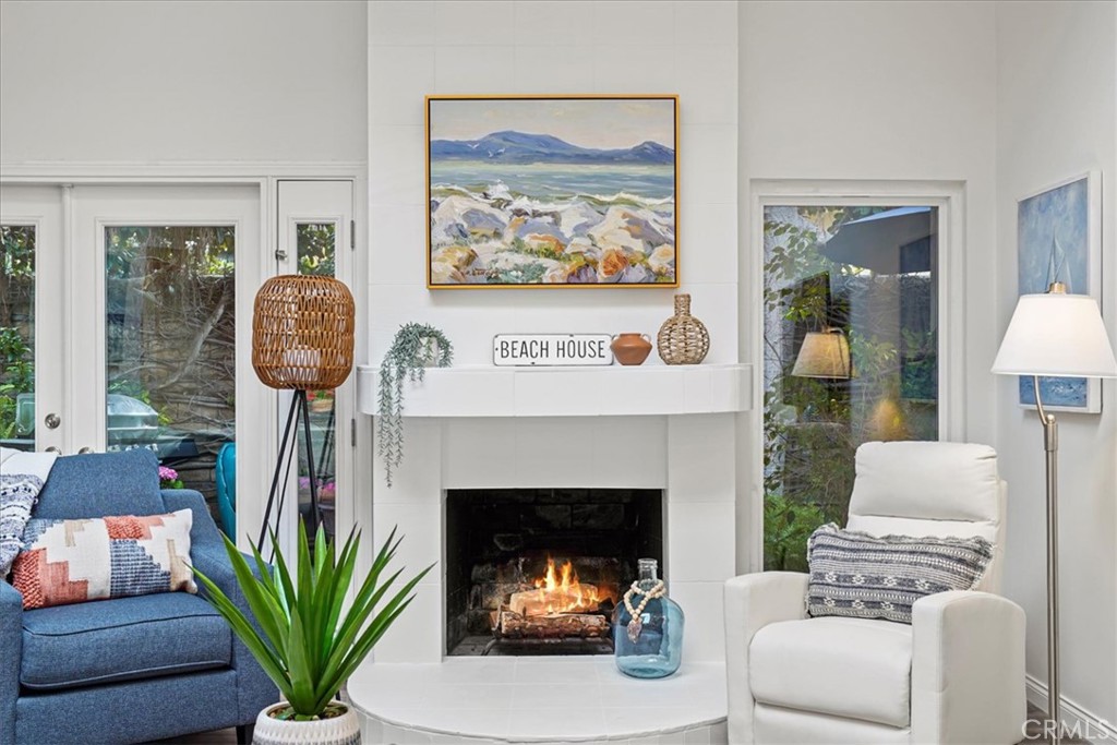23802 Cassandra Bay Dana Point, CA 92629 - Photo 1 of 56 a living room with furniture a fireplace and a potted plant