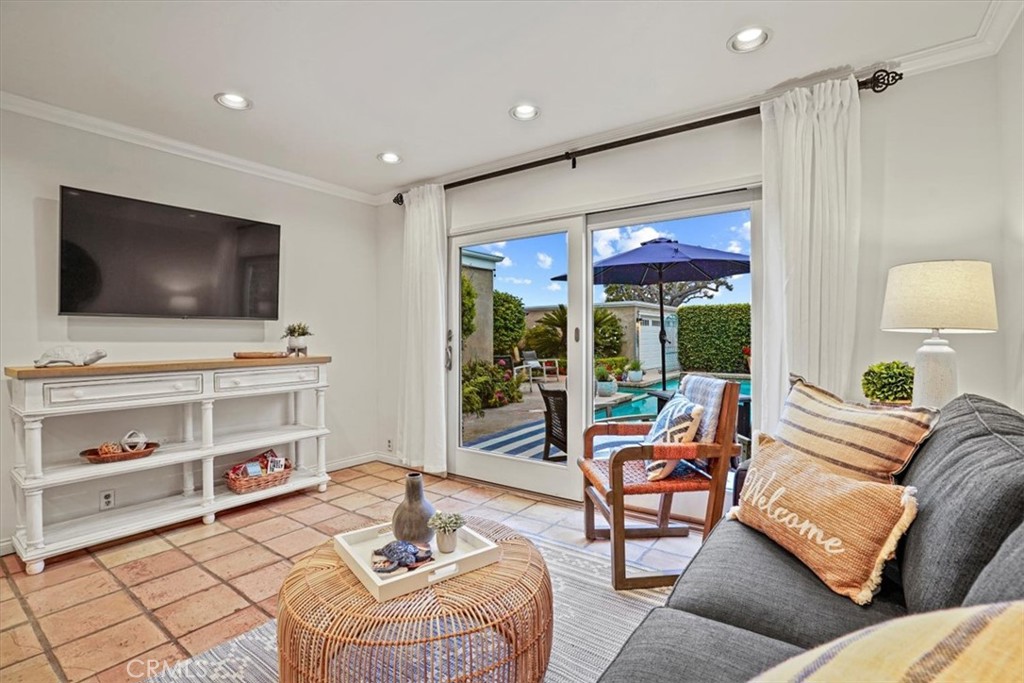 23802 Cassandra Bay Dana Point, CA 92629 - Photo 15 of 56 a living room with furniture and a flat screen tv