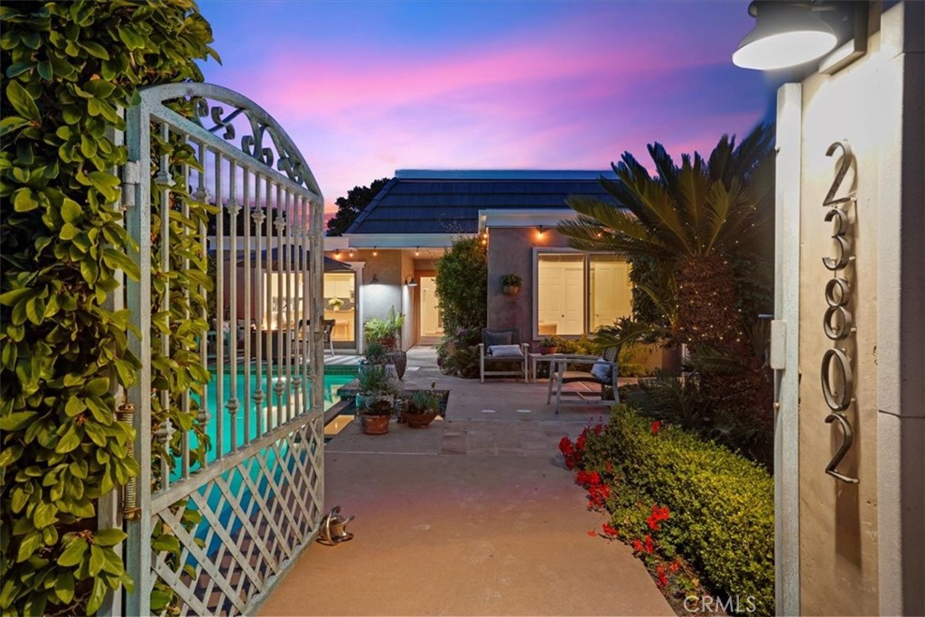 23802 Cassandra Bay Dana Point, CA 92629 - Photo 2 of 56 a view of a porch with chairs and potted plants