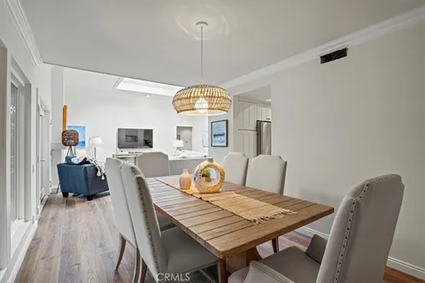 a view of a backyard with sitting area and garden