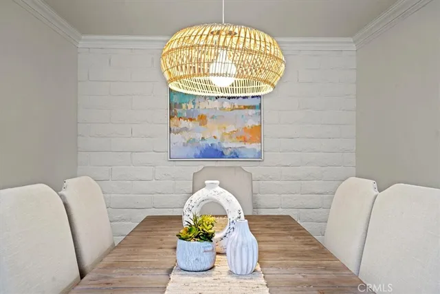 a backyard of a house with outdoor seating