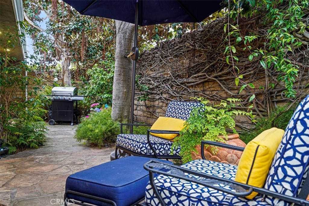 23802 Cassandra Bay Dana Point, CA 92629 - Photo 26 of 56 a backyard of a house with outdoor seating
