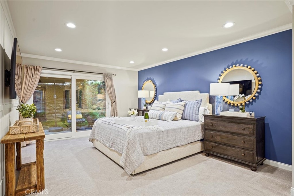 23802 Cassandra Bay Dana Point, CA 92629 - Photo 27 of 56 a bedroom with a bed and a large window