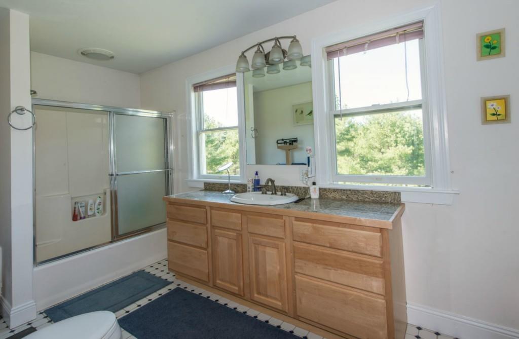 128 River Road Edgecomb, ME 04556 - Photo 14 of 22 The second floor bathroom, with...