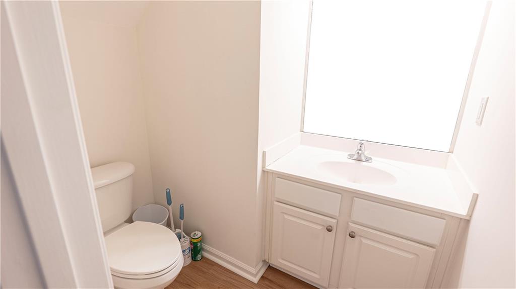 2070 Hailston Drive Northwest Duluth, GA 30097 - Photo 16 of 42 a bathroom with a sink toilet and vanity