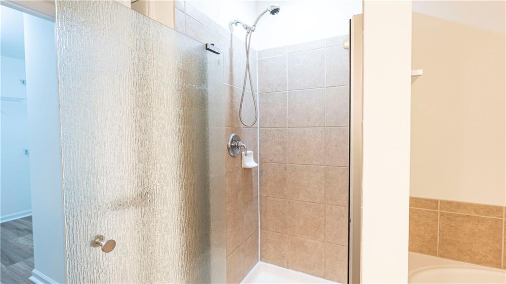 2070 Hailston Drive Northwest Duluth, GA 30097 - Photo 25 of 42 a bathroom with a shower