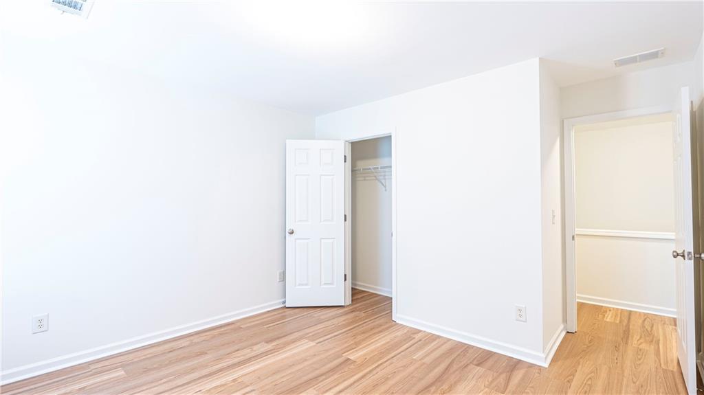 2070 Hailston Drive Northwest Duluth, GA 30097 - Photo 32 of 42 a view of a room with wooden floor