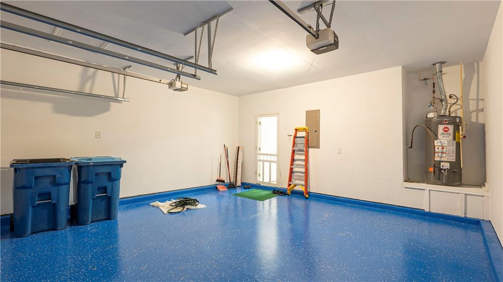 2070 Hailston Drive Northwest Duluth, GA 30097 - Photo 35 of 42 a view of an empty room with wooden floor and windows
