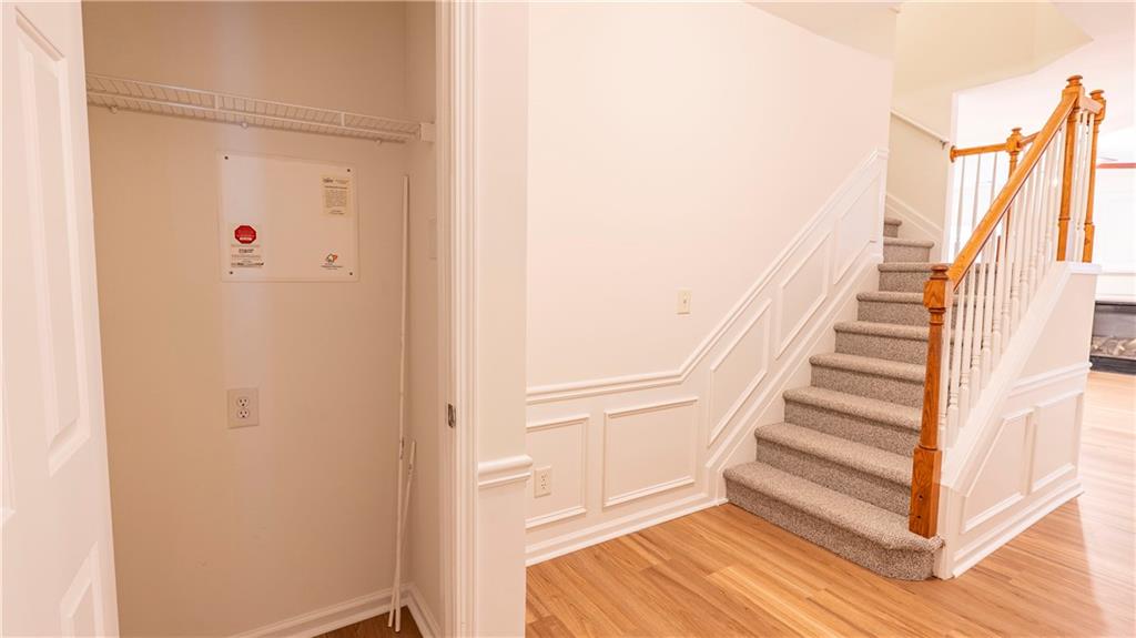 2070 Hailston Drive Northwest Duluth, GA 30097 - Photo 5 of 42 a view of entryway with wooden floor and stairs