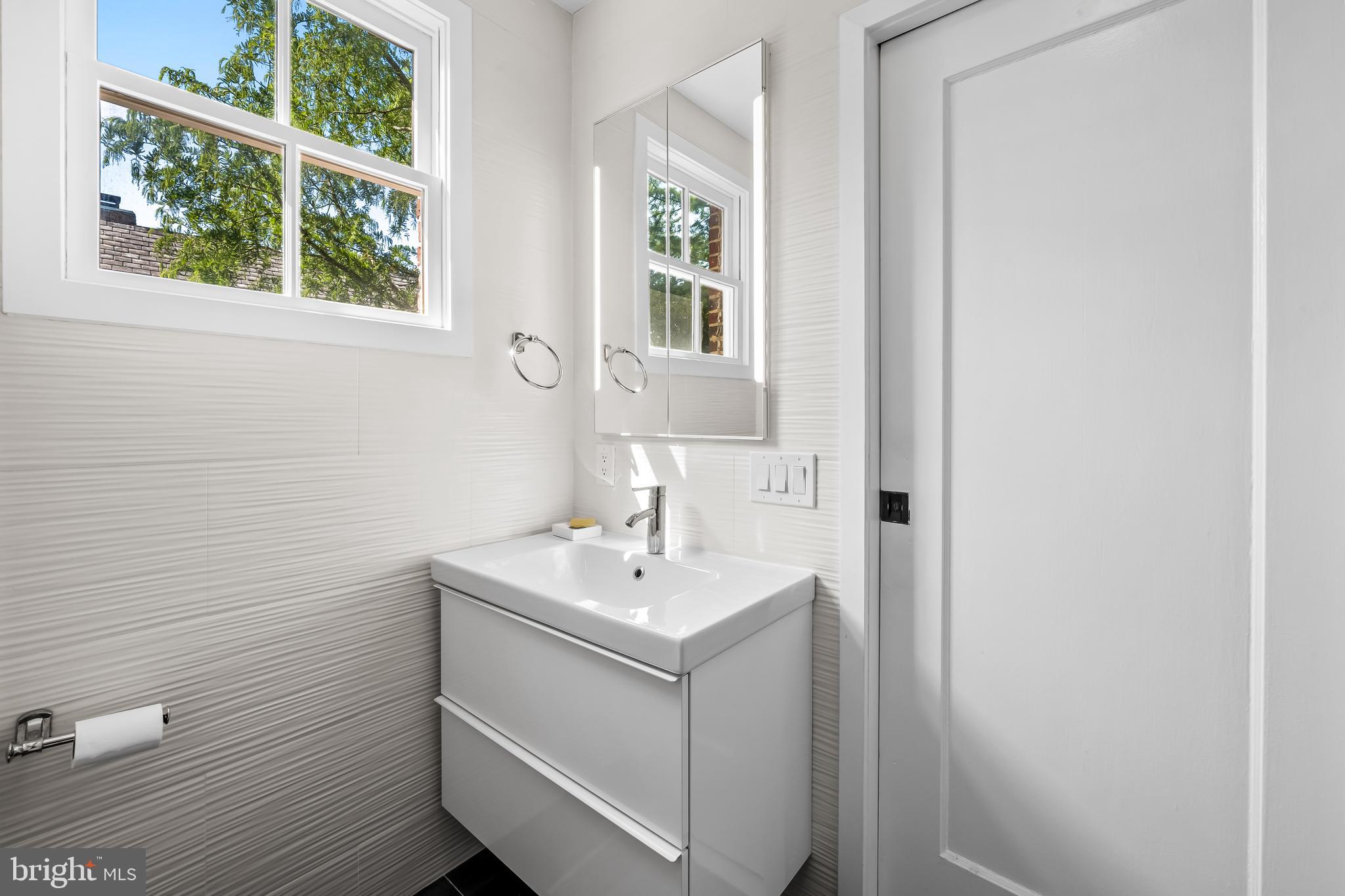 4303 Norwood Road Baltimore, MD 21218 - Photo 54 of 77 Jack and Jill bath on second level
