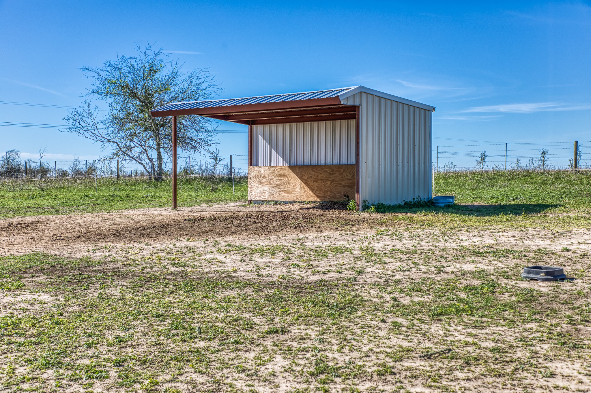 6510 Ganske Road Burton, TX 77835 - Photo 27 of 48 a view of backyard with wooden fence