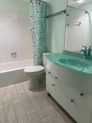 a view of a livingroom with an empty space and window