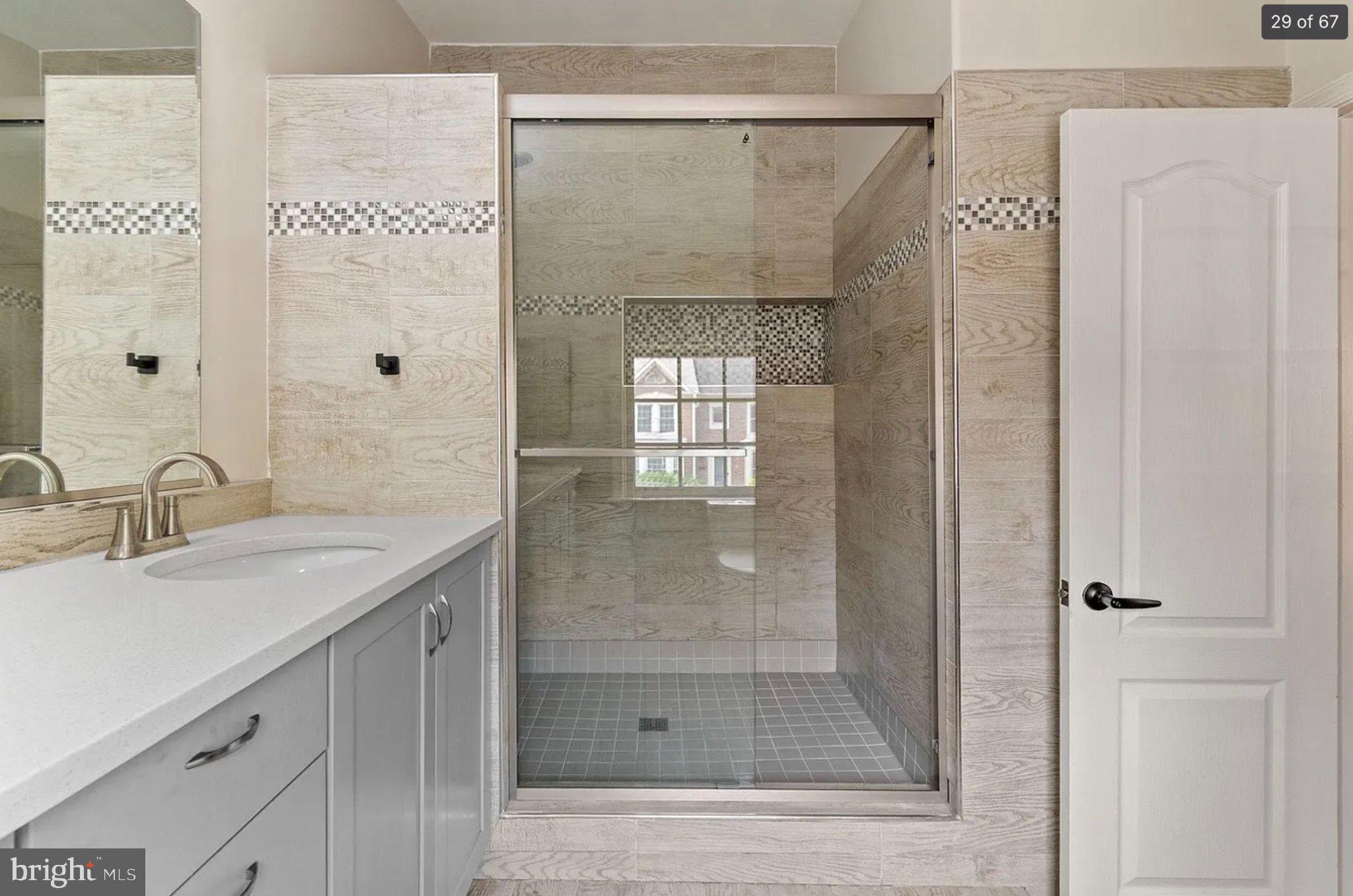 3906 Valley Ridge Drive Fairfax, VA 22033 - Photo 29 of 58 Sleek modern bathroom oasis.