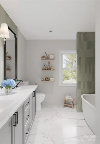 a bathroom with a sink a toilet and a bathtub