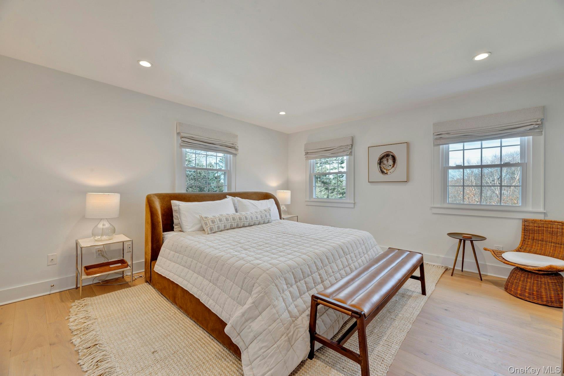 110 Sleepy Hollow Lane Southold, NY 11971 - Photo 23 of 46 Bedroom with light wood-type flooring and recessed lighting