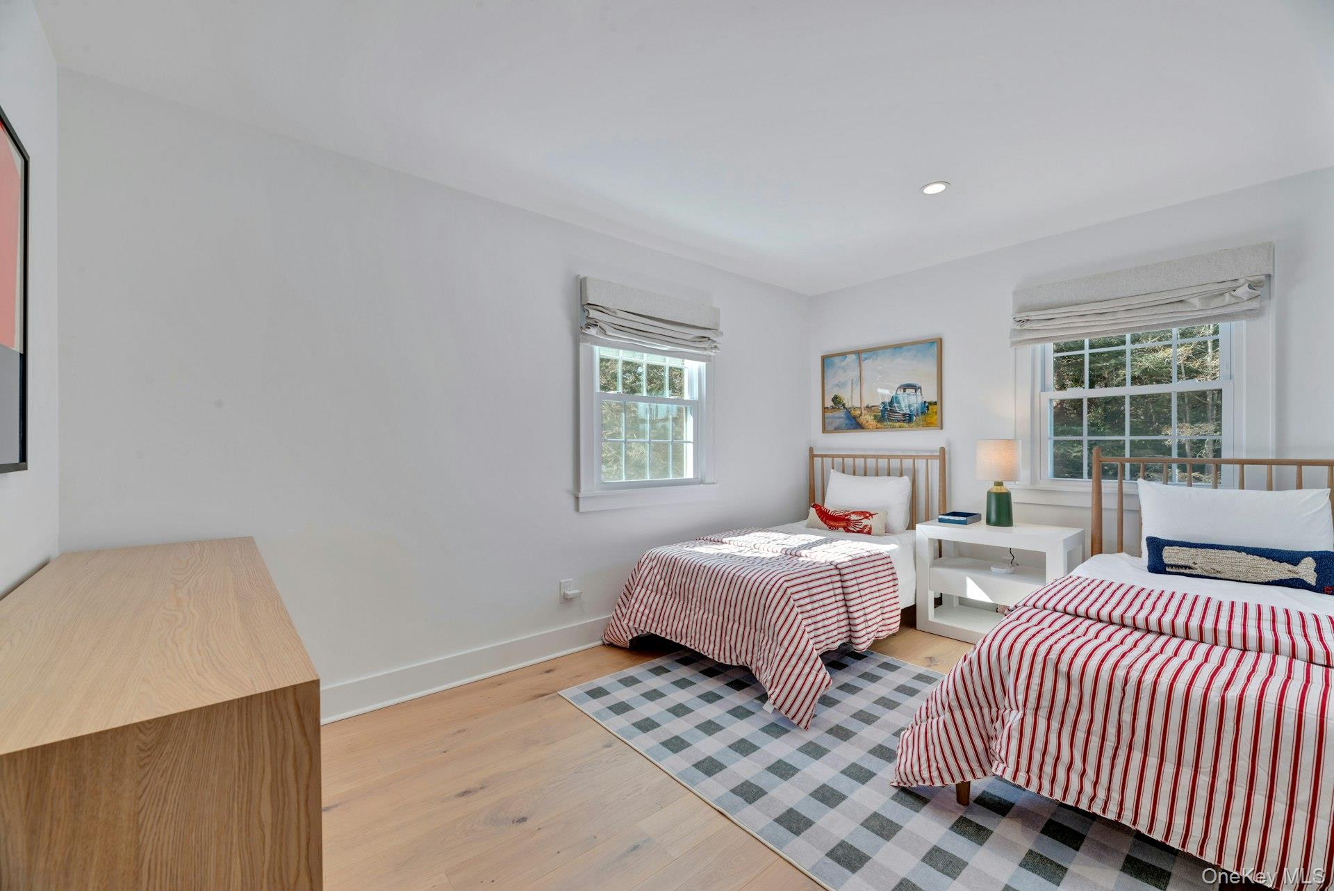110 Sleepy Hollow Lane Southold, NY 11971 - Photo 25 of 46 Bedroom featuring light wood-style flooring and recessed lighting