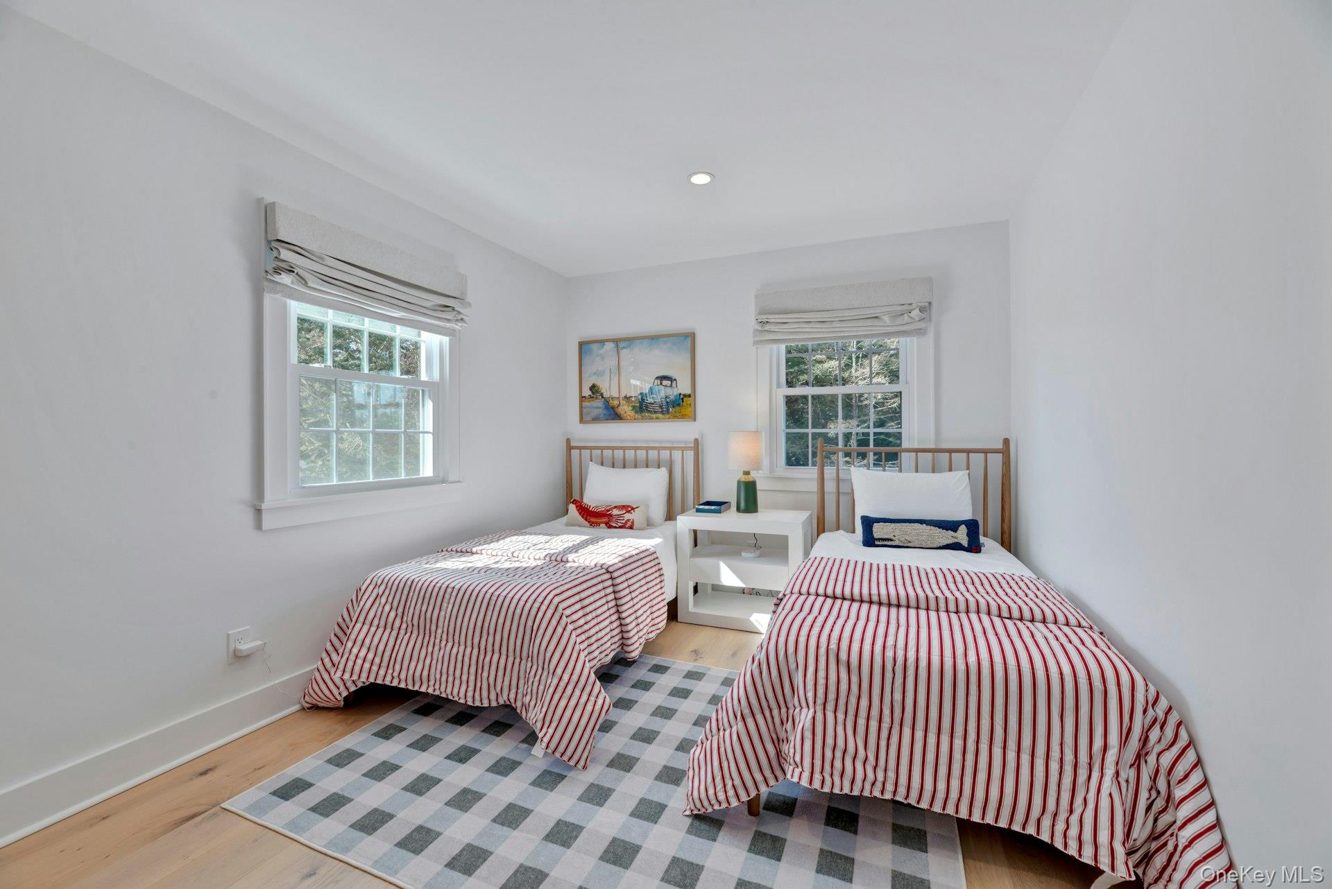 110 Sleepy Hollow Lane Southold, NY 11971 - Photo 26 of 46 Bedroom featuring wood finished floors and recessed lighting
