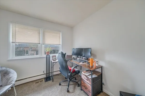 a room with furniture and a window