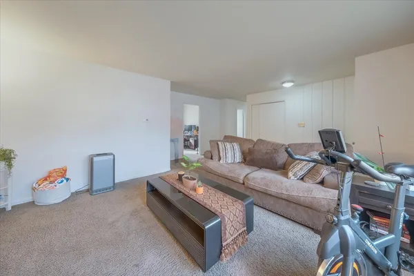 a living room with furniture and a couch