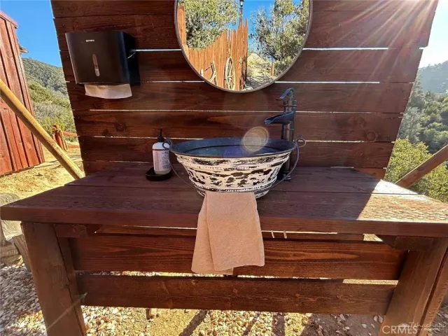 a view of a door with a bench